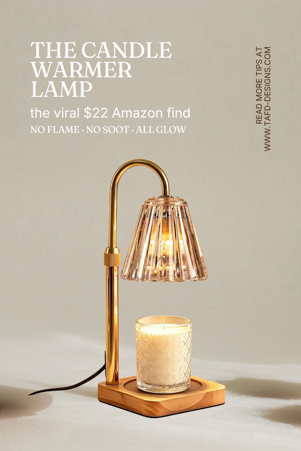 Brass candle warmer lamp glowing over a textured glass candle — the viral $22 Amazon find
